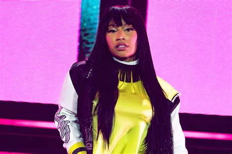 nicki minaj versace nip|Nicki Minaj Suffers Wardrobe Malfunction During Concert .